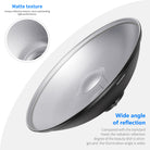 The beauty dish uses a parabolic reflector to distribute light towards a focal point.